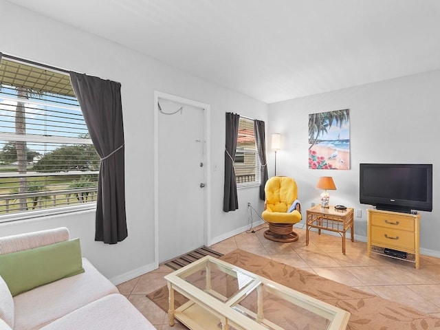 living room with light tile patterned floors