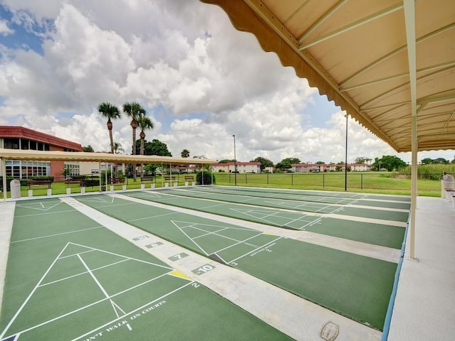 view of home's community with a lawn