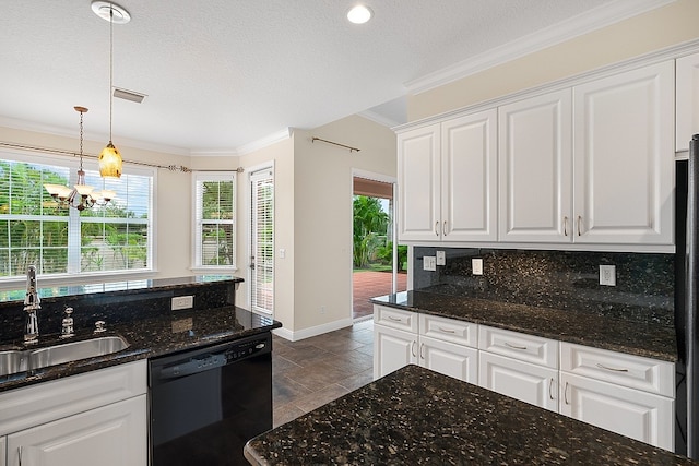 kitchen with dishwasher, sink, a notable chandelier, and white cabinets