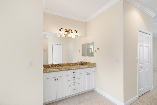 bathroom featuring tile patterned flooring, vanity, and ornamental molding