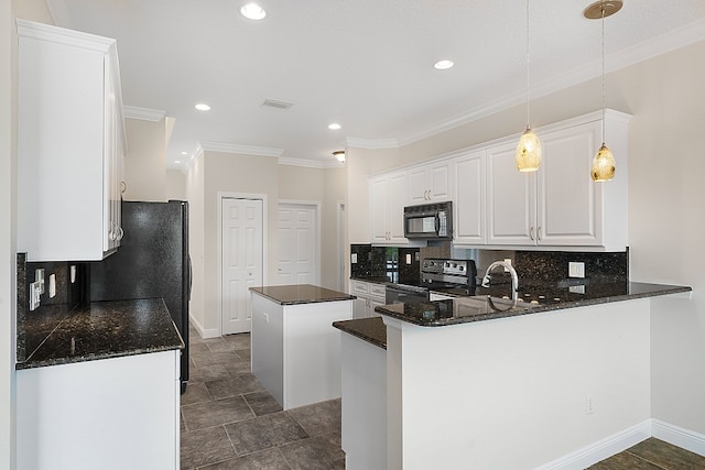 kitchen with decorative backsplash, white cabinetry, black appliances, and kitchen peninsula