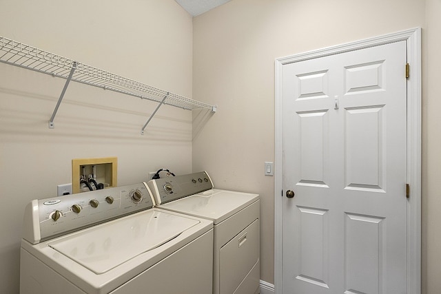 washroom featuring separate washer and dryer