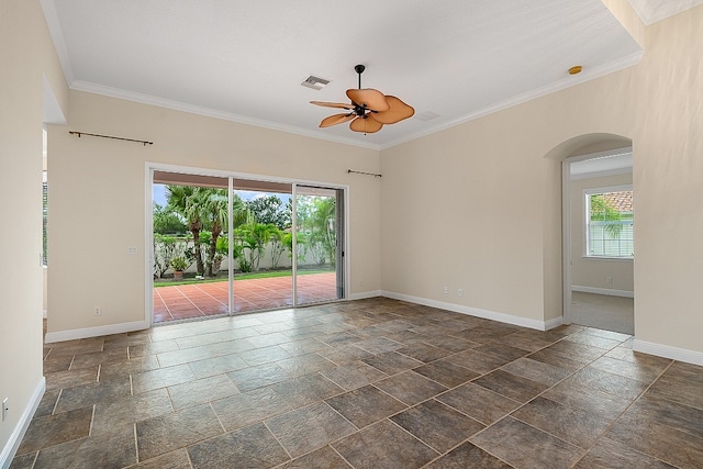 spare room featuring ornamental molding and ceiling fan