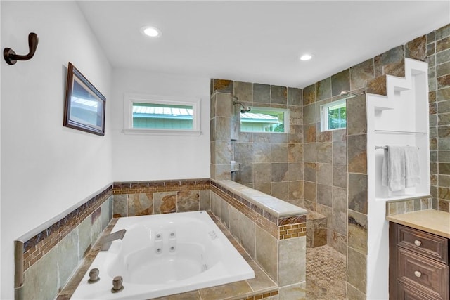2410 47th Ter, Vero Beach, FL 32966 - full bathroom with a jetted tub, walk in shower, recessed lighting, and vanity