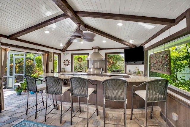2410 47th Ter, Vero Beach, FL 32966 - view of patio featuring an outdoor kitchen and a ceiling fan