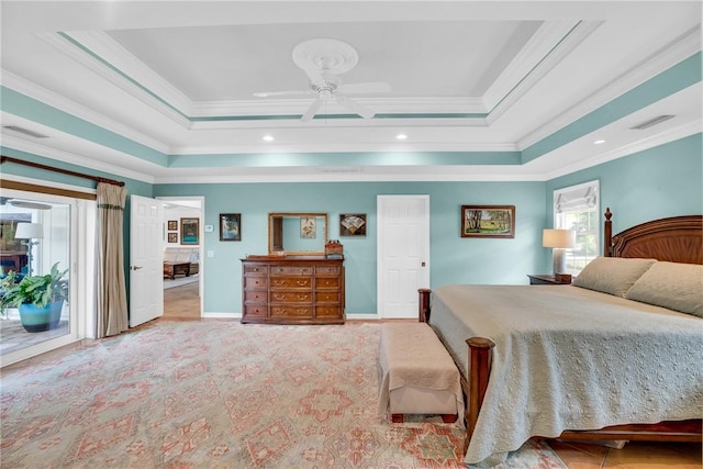 2410 47th Ter, Vero Beach, FL 32966 - carpeted bedroom with a tray ceiling, access to exterior, crown molding, and a ceiling fan
