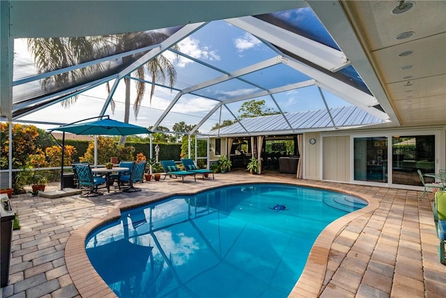 2410 47th Ter, Vero Beach, FL 32966 - outdoor pool with a patio area and glass enclosure