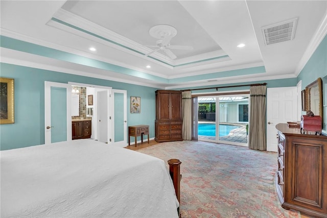 2410 47th Ter, Vero Beach, FL 32966 - bedroom featuring access to exterior, a raised ceiling, ornamental molding, light carpet, and recessed lighting