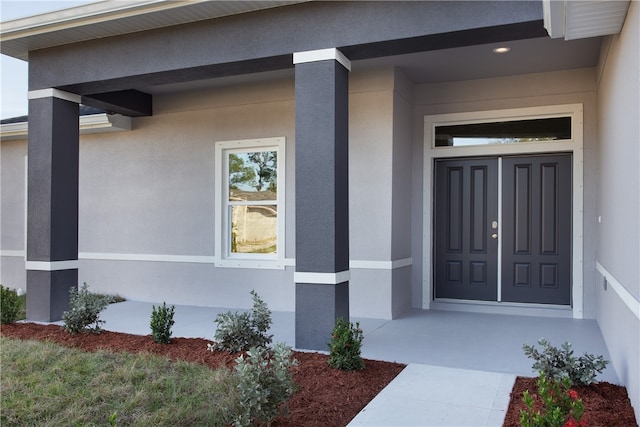 property entrance with a porch