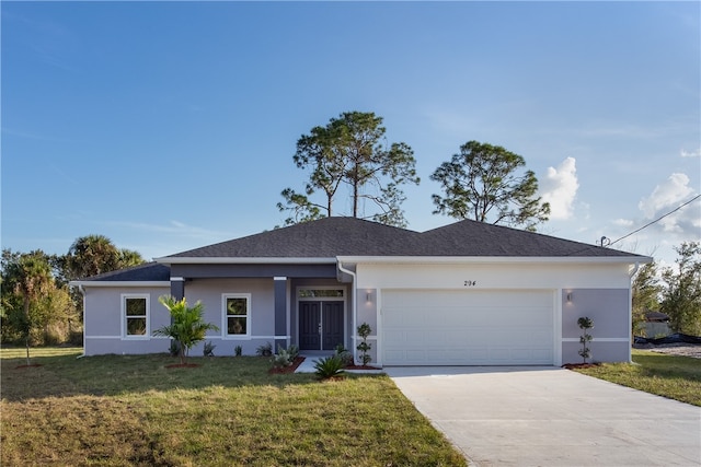 ranch-style home with a garage and a front yard