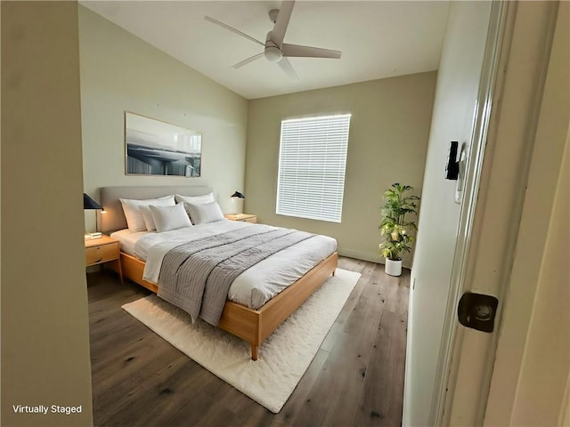 6075 46th Ln, Vero Beach, FL 32967 - bedroom with wood finished floors and a ceiling fan