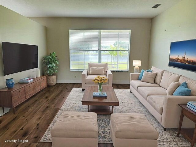 6075 46th Ln, Vero Beach, FL 32967 - living area with wood finished floors and baseboards
