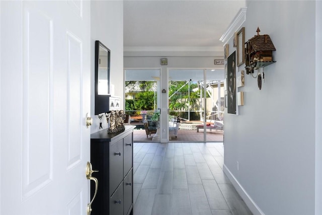 8720 Wakefield Dr, West Palm Beach, FL 33410 - hallway featuring baseboards and ornamental molding
