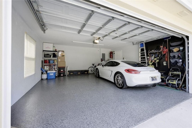 8720 Wakefield Dr, West Palm Beach, FL 33410 - garage with a garage door opener