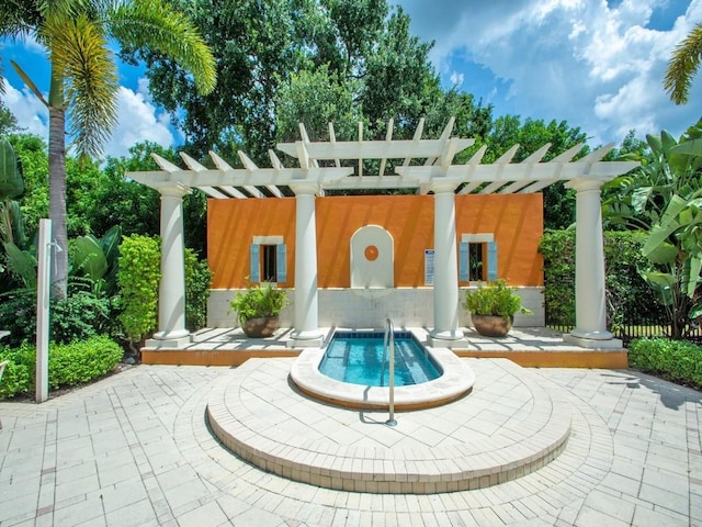 view of patio featuring a pergola