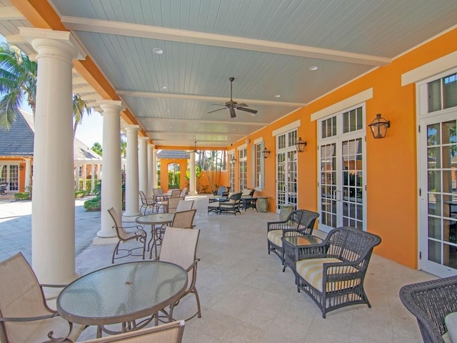 view of patio featuring ceiling fan and french doors