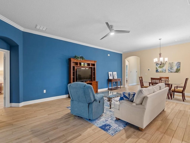 living room featuring crown molding, ceiling fan with notable chandelier, a textured ceiling, and light hardwood / wood-style floors