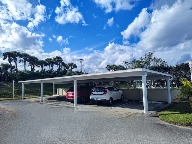 view of car parking featuring a carport