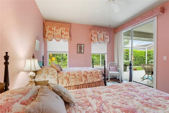 bedroom featuring ceiling fan and access to exterior