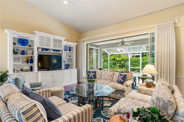 living room with lofted ceiling and ceiling fan