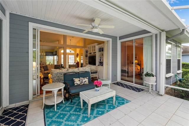 view of patio / terrace with ceiling fan and outdoor lounge area