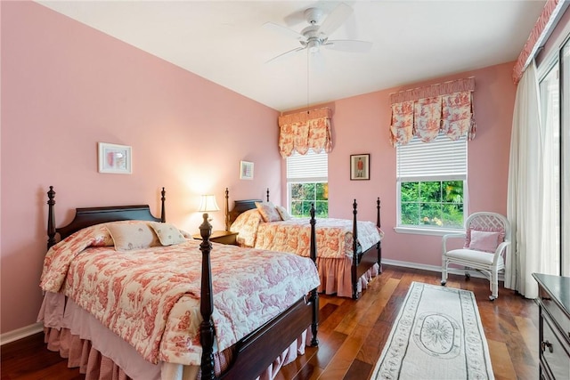 bedroom featuring ceiling fan and hardwood / wood-style flooring