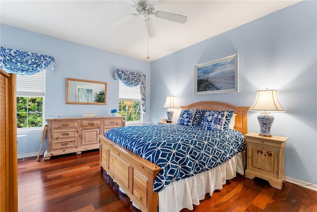 bedroom featuring ceiling fan and dark hardwood / wood-style flooring