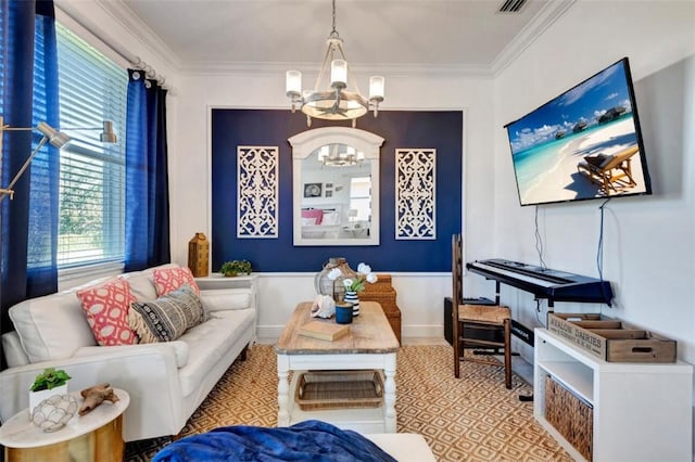 sitting room with a notable chandelier and ornamental molding