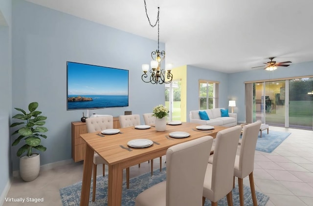 1877 Grey Falcon Cir SW, Vero Beach, FL 32962 - dining space with light tile patterned floors, a chandelier, baseboards, and a ceiling fan