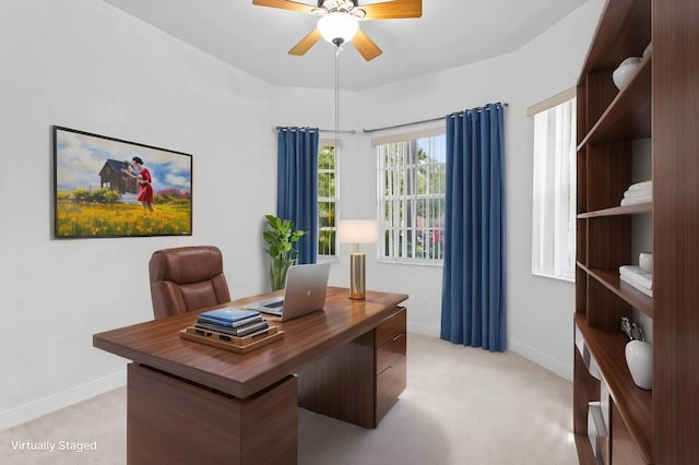 1877 Grey Falcon Cir SW, Vero Beach, FL 32962 - obstructed view of property with stucco siding, driveway, a garage, and a front lawn