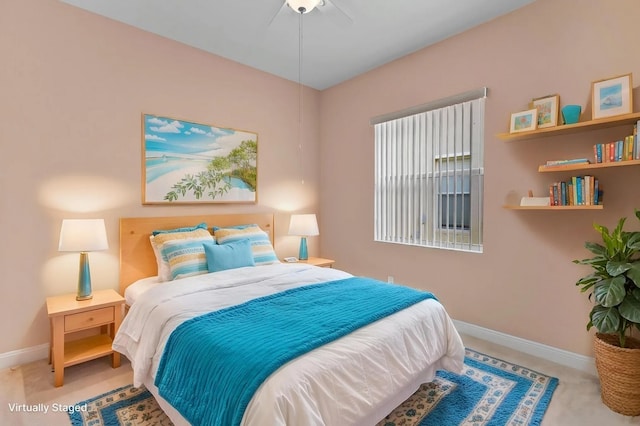 1877 Grey Falcon Cir SW, Vero Beach, FL 32962 - bedroom with baseboards, carpet, and ceiling fan