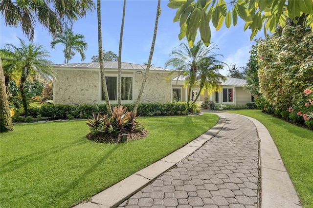 view of front facade with a front yard