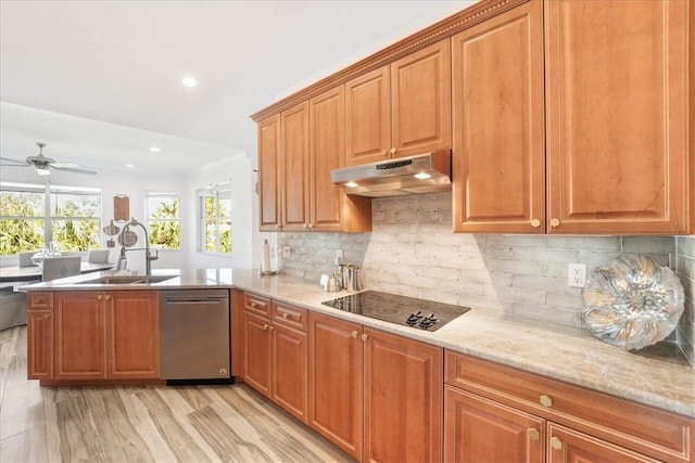 kitchen featuring sink, tasteful backsplash, black electric stovetop, light hardwood / wood-style floors, and stainless steel dishwasher