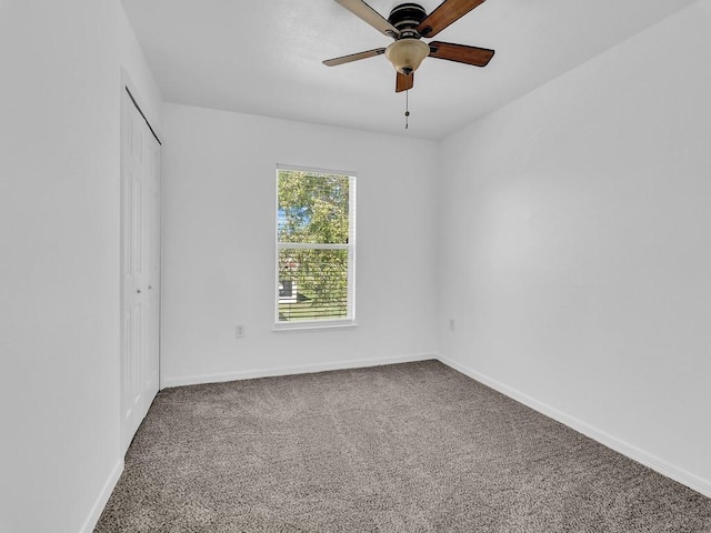5985 Ridge Lake Cir, Vero Beach, FL 32967 - unfurnished room with carpet and a ceiling fan