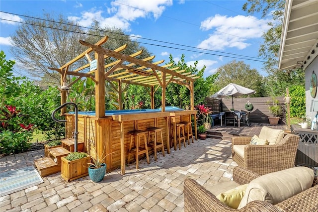 view of patio featuring a bar