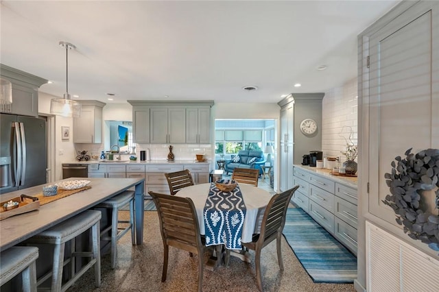 dining room featuring sink