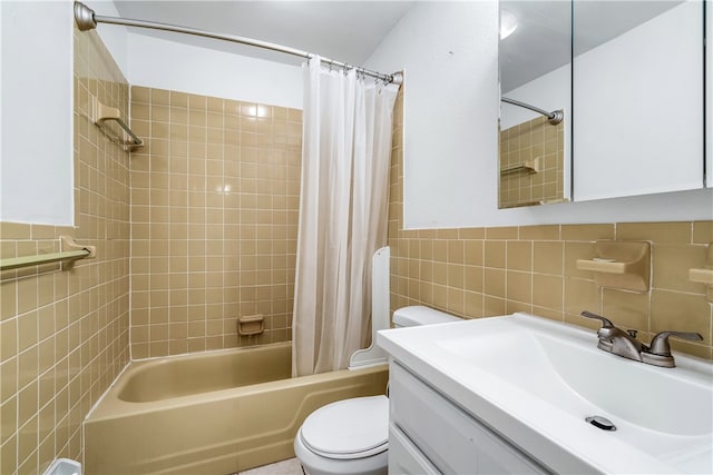 full bathroom featuring toilet, shower / tub combo, tile walls, and vanity