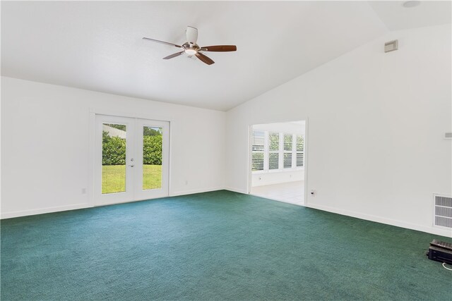 unfurnished room featuring a healthy amount of sunlight, carpet floors, ceiling fan, and french doors