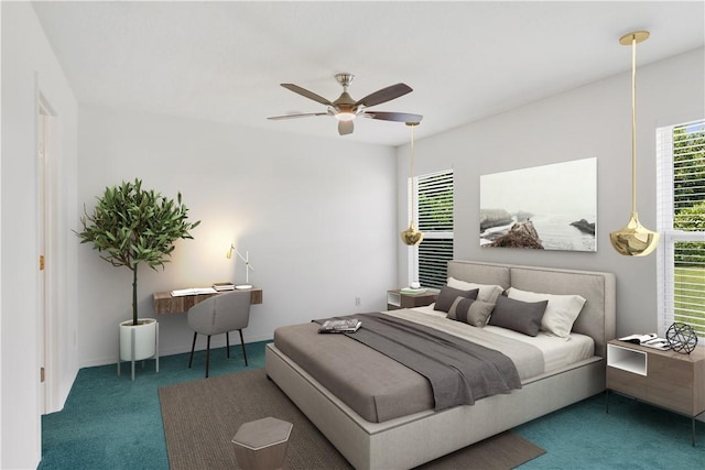 bedroom with ceiling fan and dark carpet