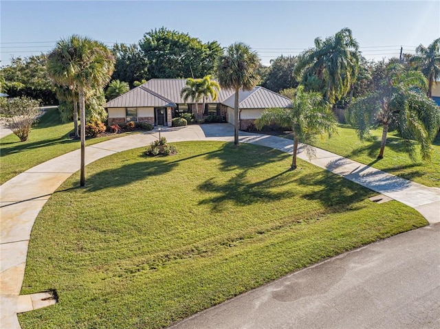 view of front of home with a front lawn