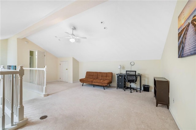 sitting room featuring vaulted ceiling, light colored carpet, an upstairs landing, ceiling fan, and baseboards