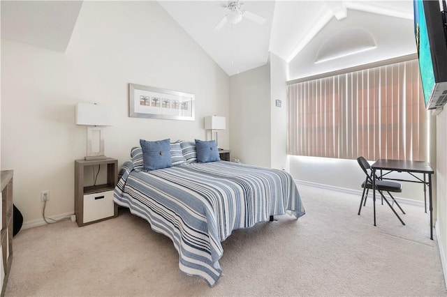 carpeted bedroom with lofted ceiling, baseboards, and ceiling fan