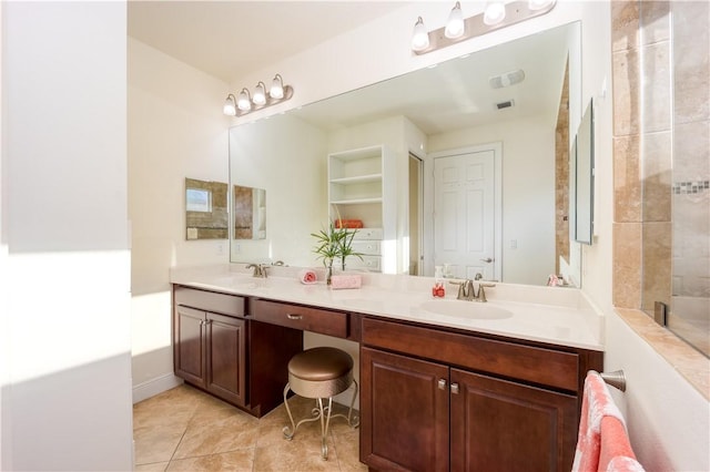 1122 4th Ln SW, Vero Beach, FL 32962 - bathroom featuring double vanity, tile patterned floors, and a tub