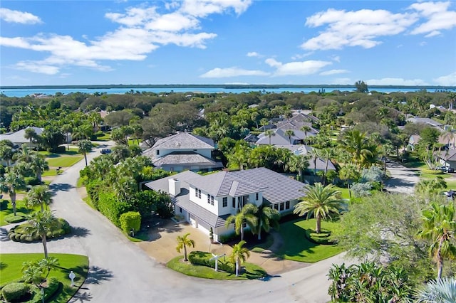 drone / aerial view with a water view