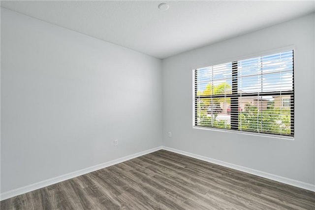 empty room featuring hardwood / wood-style flooring