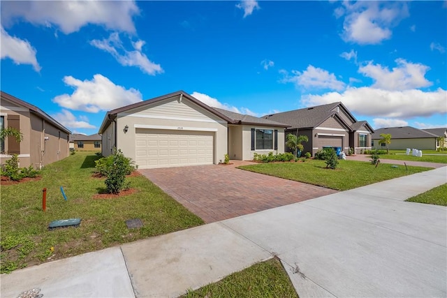 ranch-style home with a garage and a front yard