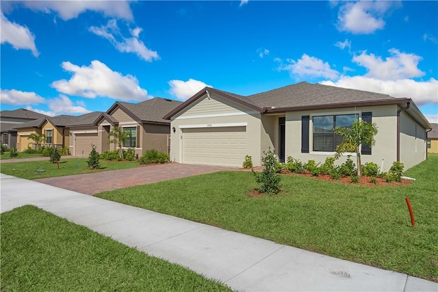 ranch-style home with a garage and a front yard