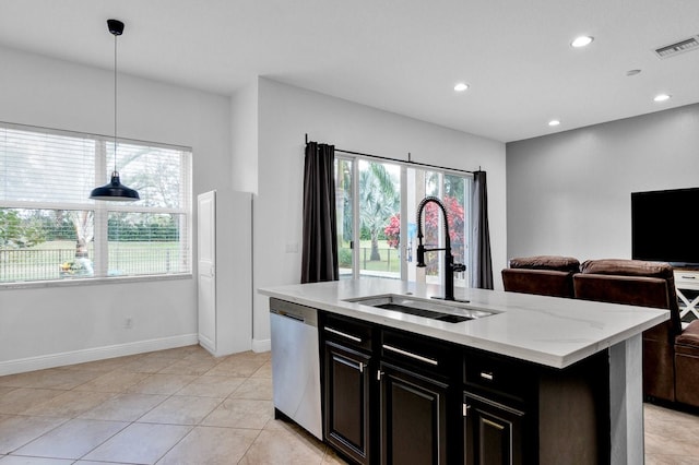 kitchen with dishwasher, decorative light fixtures, plenty of natural light, and sink