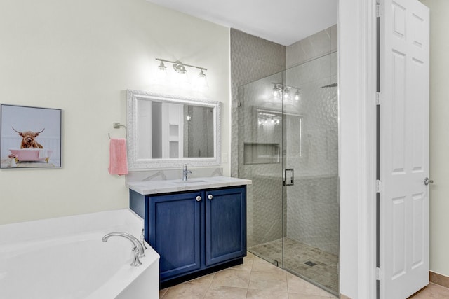 bathroom featuring tile patterned flooring, vanity, and independent shower and bath