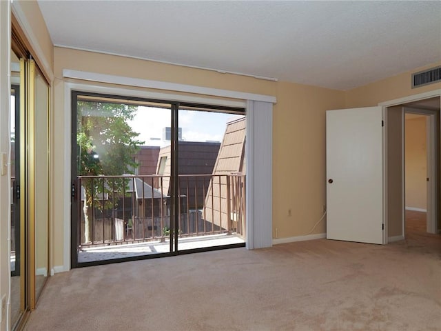 empty room with carpet floors